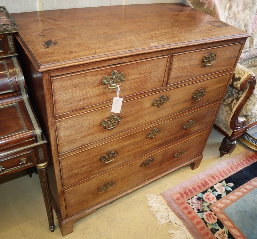 A George III mahogany chest of two short and three graduated long drawers, W.104cm